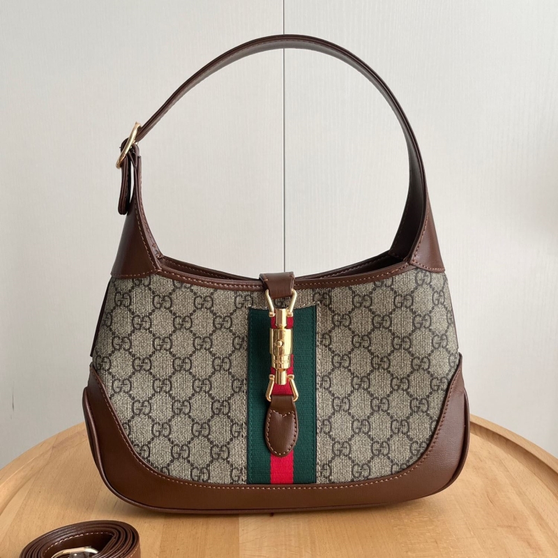 G*u*i top handle bags